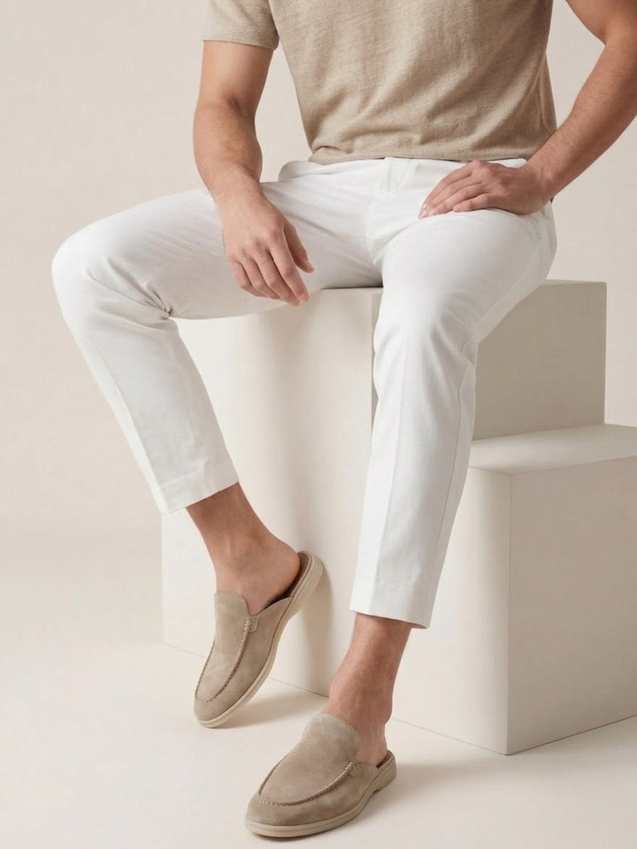 Breathable men's mules; easy wear slip-on design & smart stitched detail. Perfect for casual summer fashion.