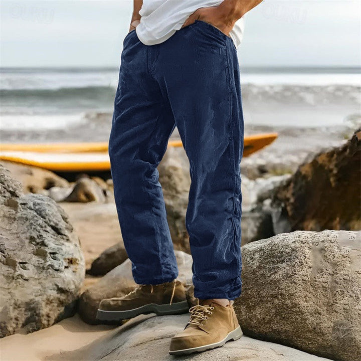 Comfortable men's straight leg ribbed pants with a unique texture, ideal for everyday wear and smart casual styling.