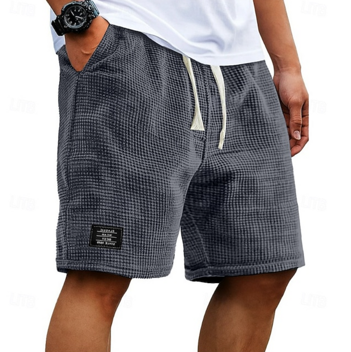 Men's casual summer shorts, perfect for everyday comfort & relaxed style in warm weather. Breathable fabric.
