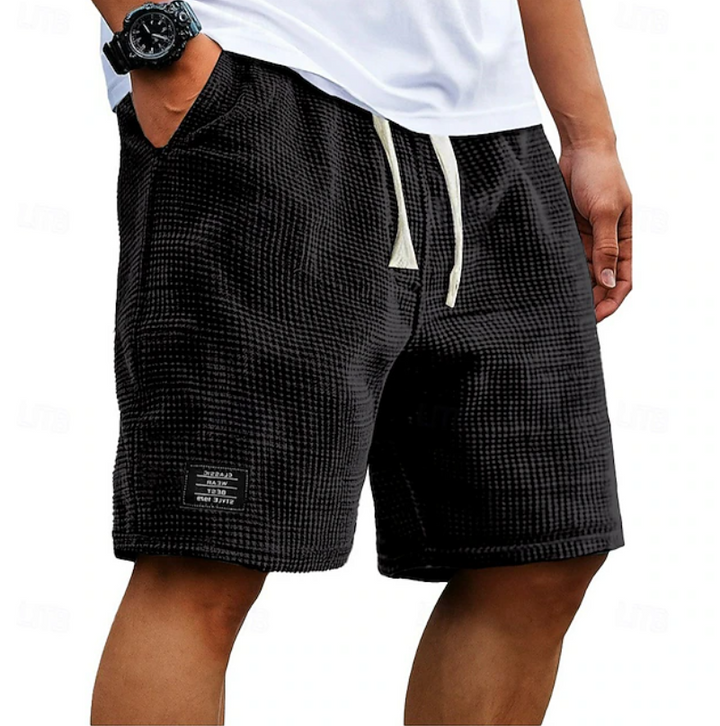Breathable men's summer shorts, ideal for warm weather. Casual style for everyday comfort & fashion.
