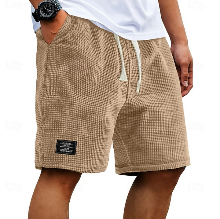 Comfortable men's casual shorts for daily wear, leisure & summer activities. Relaxed fit for warm weather.