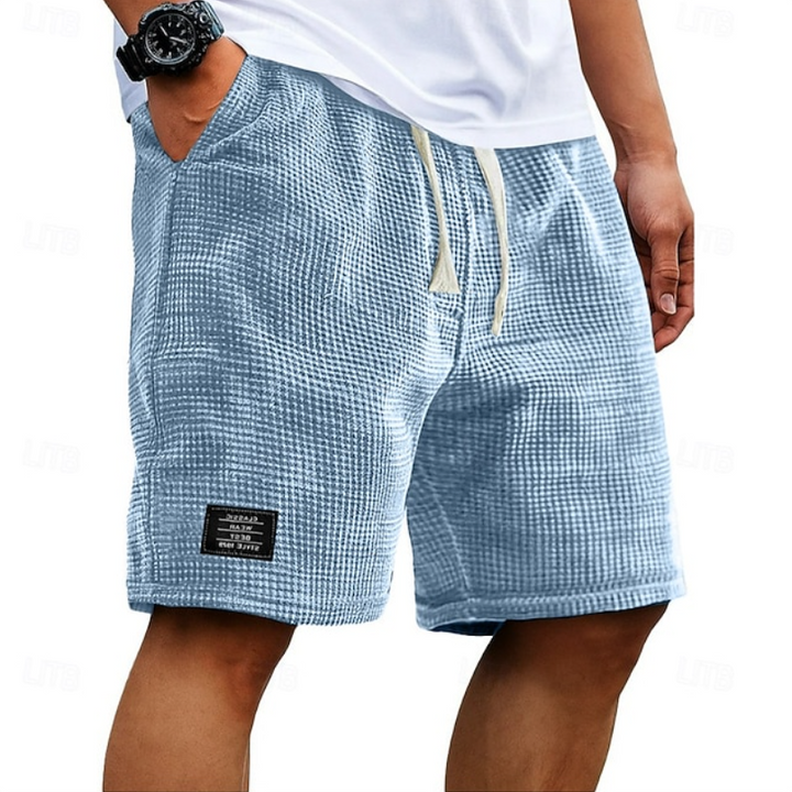 Stylish men's casual summer shorts. Comfortable & breathable for warm weather, perfect for daily outfits.