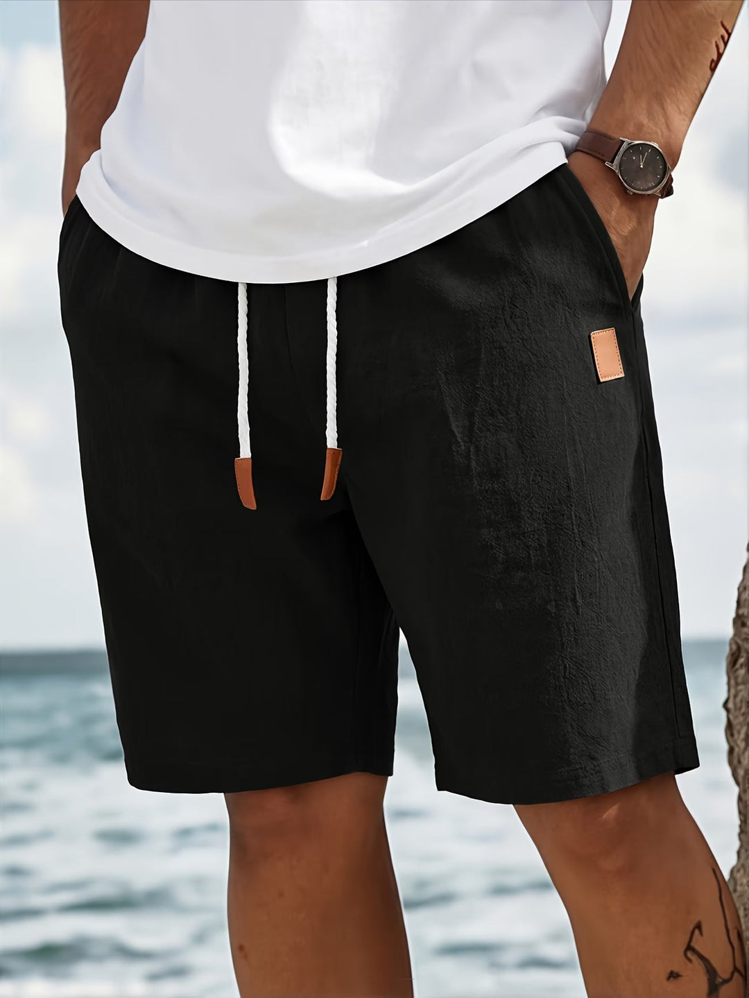 Effortless men's summer drawstring shorts for a relaxed, comfortable fit; perfect for casual warm weather menswear.