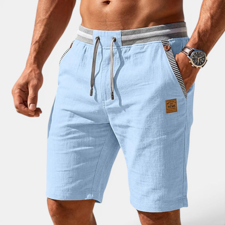 Soft, comfortable men's summer shorts with elastic waist and drawstring, perfect for a relaxed casual look.