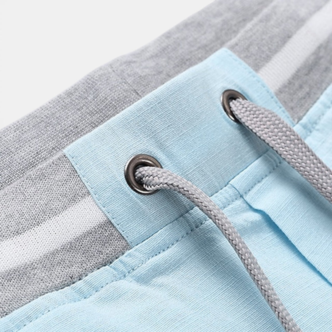 Elastic waist men's summer shorts with drawstring. Comfortable, casual, and versatile for any warm day.