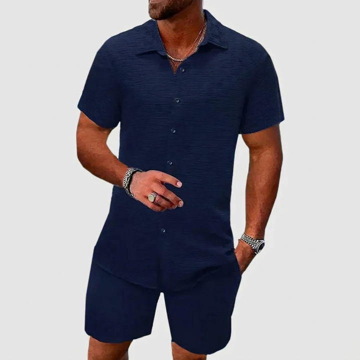 Men's summer vacation outfit: stylish two-piece set with a casual short-sleeve button-up shirt and shorts.