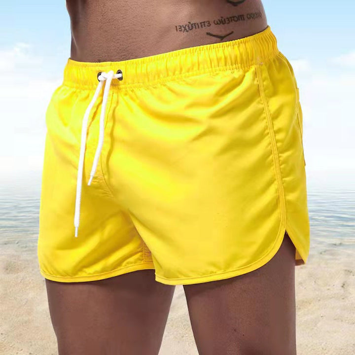 Quick-dry men's beach shorts with drawstring for comfort and casual summer wear.