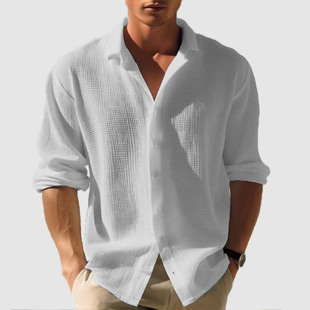 Stylish men's textured long sleeve button-down shirt, great for layering or standalone casual wear.