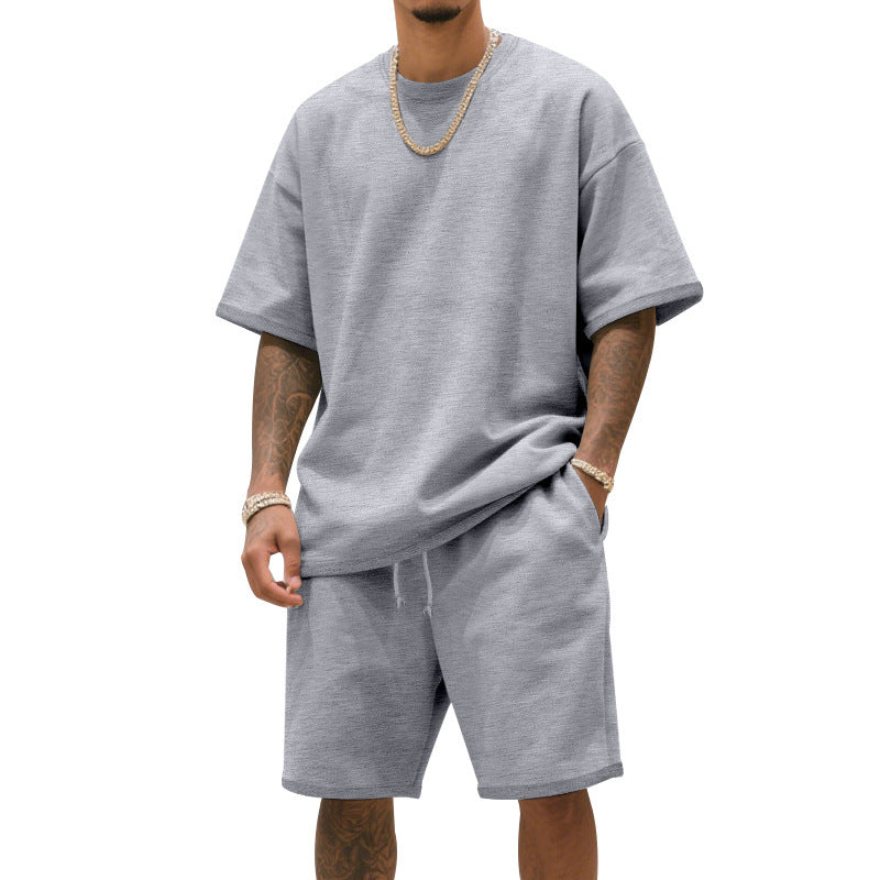 Athletic men's t-shirt and shorts set, ideal for summer sports, gym, or comfortable loungewear.