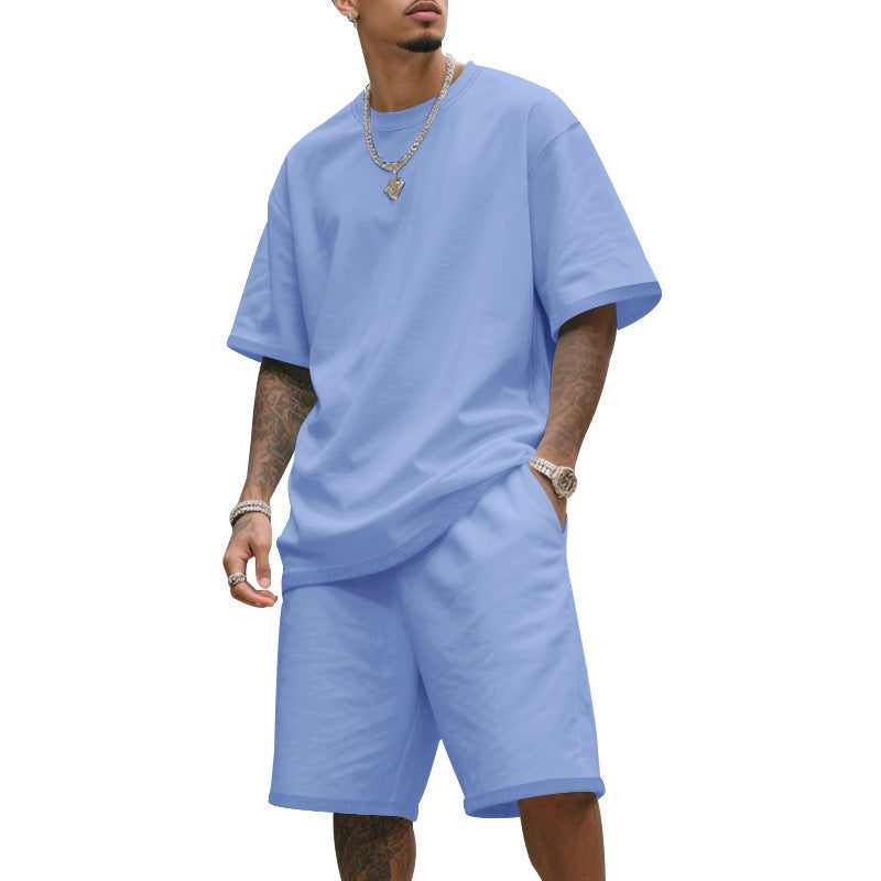 Stylish men's sportswear set: short-sleeve t-shirt & matching shorts, designed for ultimate comfort.