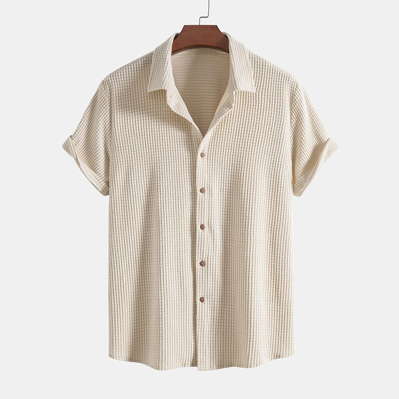 Relaxed fit men's casual shirt and shorts coordinating set. Stylish two-piece summer fashion and vacation wear.