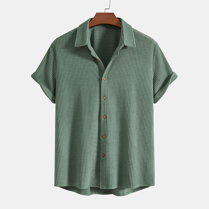 Breathable men's casual two-piece shirt & shorts set. Comfortable relaxed fit for summer fashion and travel.