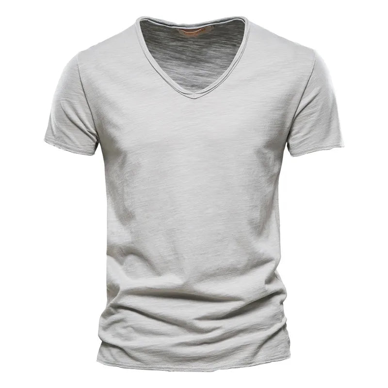 Lightweight men's V-neck casual shirt. Short sleeve summer apparel, perfect for relaxed style.