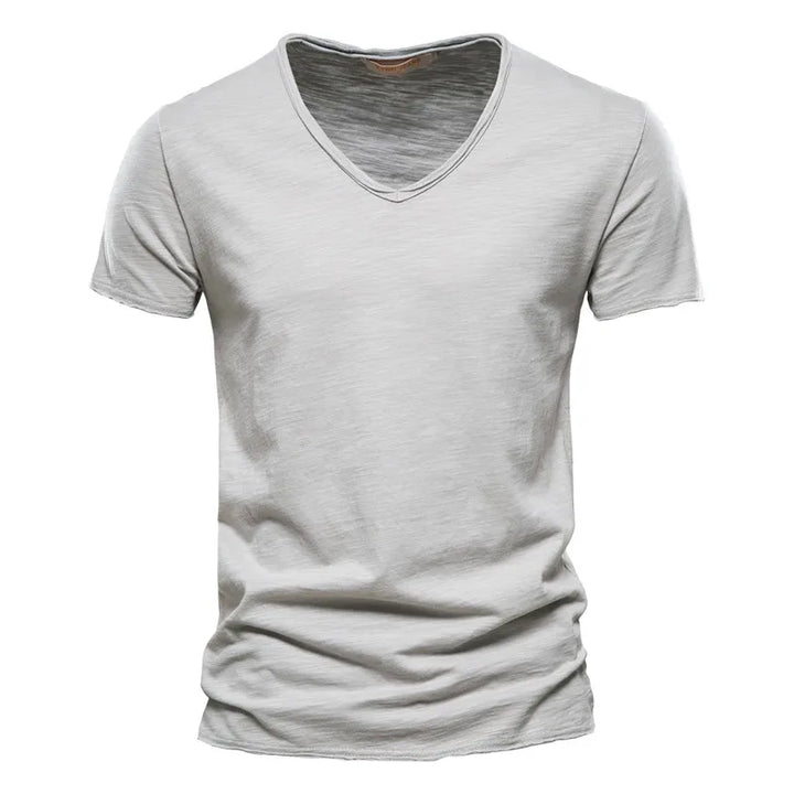 Lightweight men's V-neck casual shirt. Short sleeve summer apparel, perfect for relaxed style.