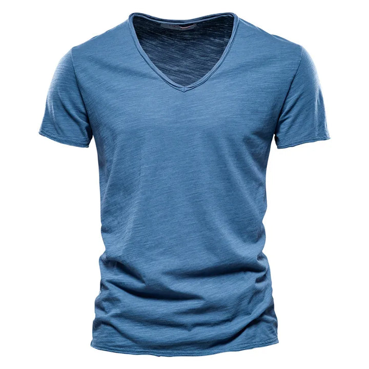 Comfortable men's V-neck summer shirt. Casual short sleeve top, ideal for warm weather wear.