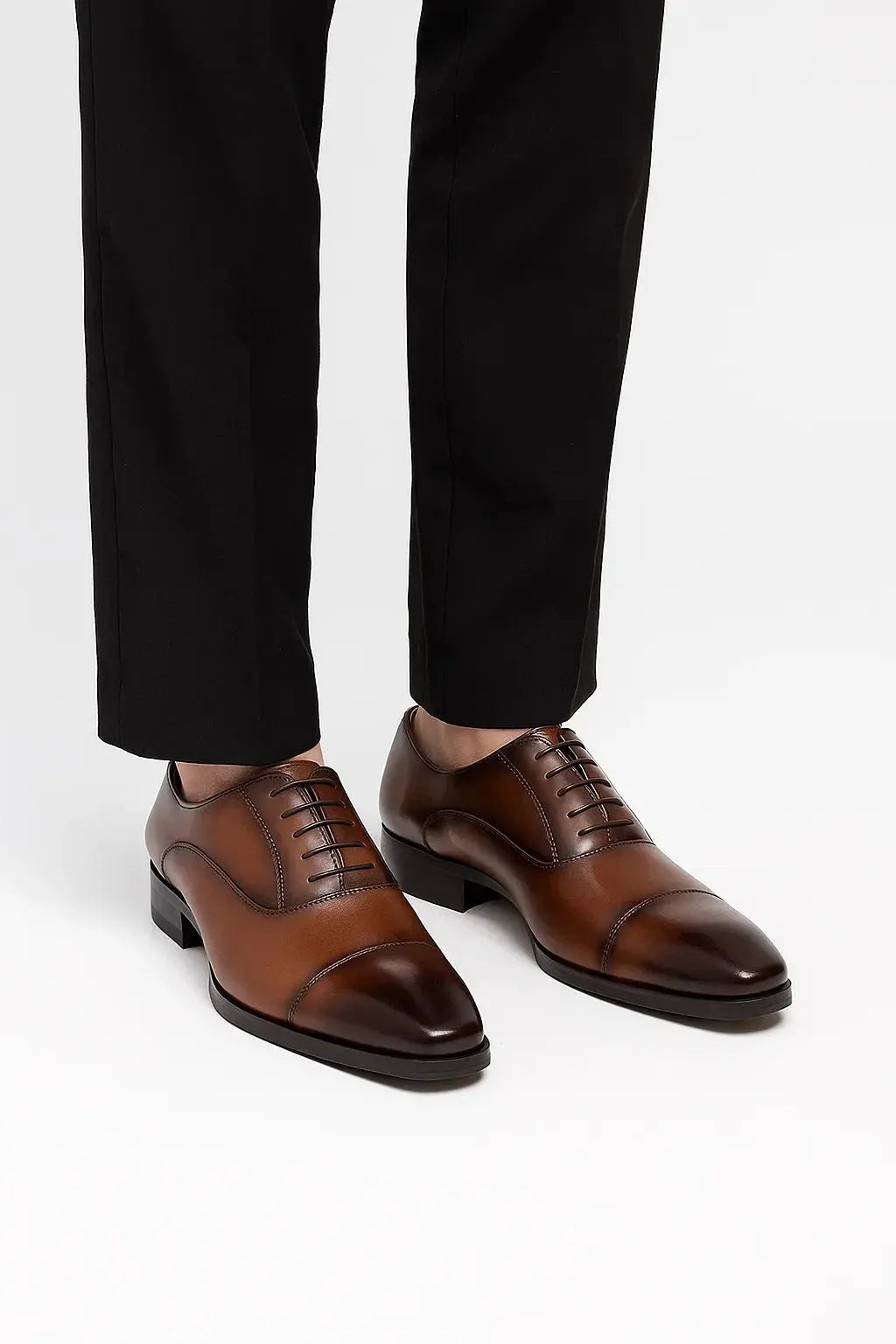 Polished men's black Derby formal shoes, essential elegant footwear for business attire and classic style outfits.