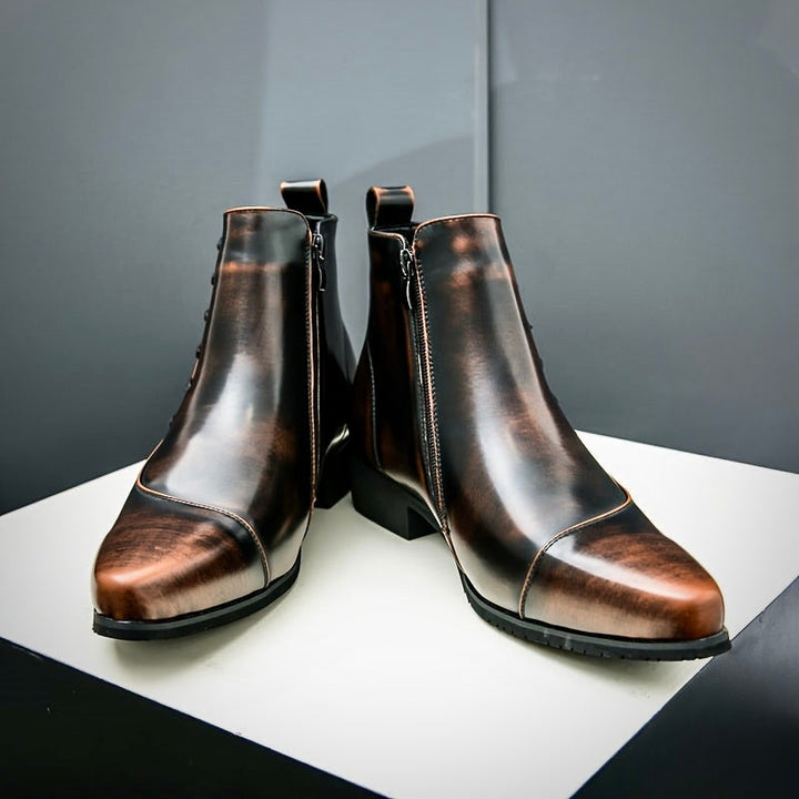 Polished men's refined leather dress boots, durable for formal occasions and classic business attire.
