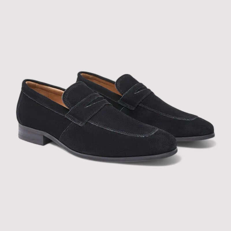 Men's classic black leather penny loafers, perfect for timeless casual or formal style with slip-on comfort.