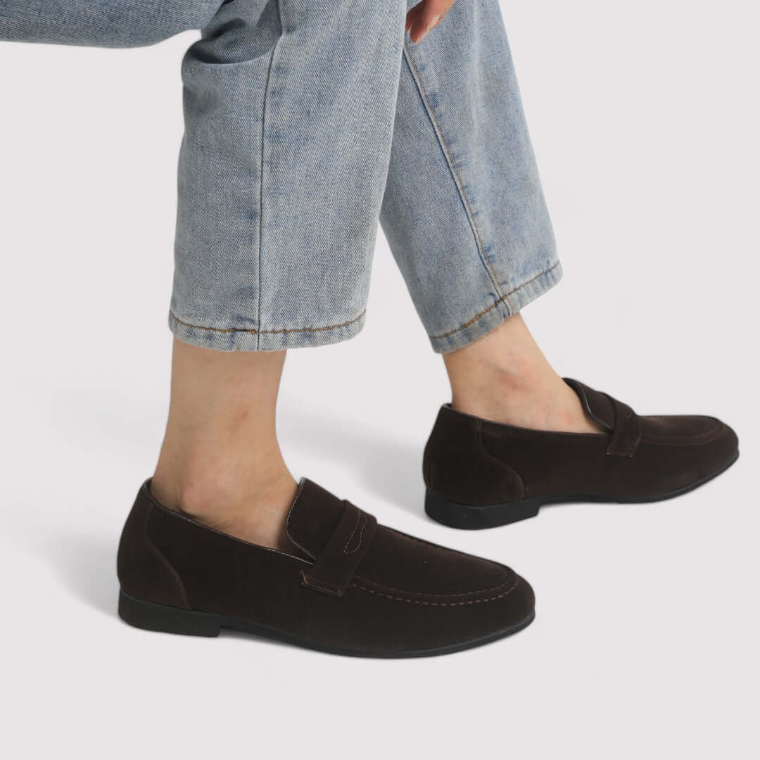 Stylish men's brown leather penny loafers, ideal slip-on shoes for office or smart casual events. Durable & comfortable.