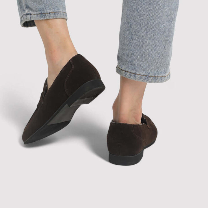 Classic men's caramel leather penny loafers, versatile slip-on footwear for both casual and formal occasions.