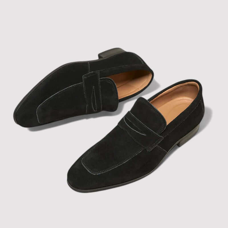 Elegant men's penny loafers in rich brown leather, offering classic style and comfortable slip-on wear for fashion.