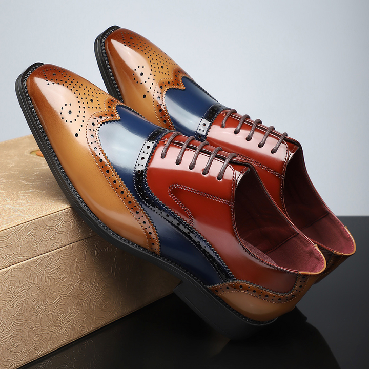 Side profile of comfortable men's wingtip brogue dress shoes, designed for all-day wear at the office or formal events.