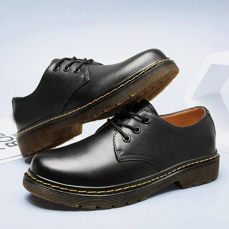 Men's classic black Oxford dress shoes for formal events & business wear. Polished & elegant.