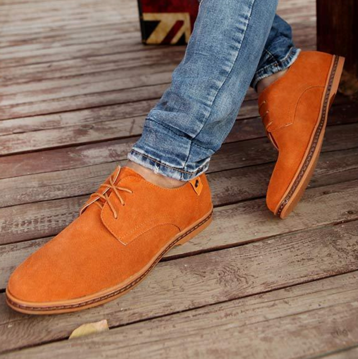Classic men's elegant Oxford dress shoes, combining refined style with a comfortable fit for long-lasting formal wear.