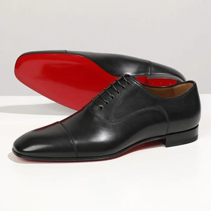 Classy men's black formal Oxford shoes, perfect for a polished look, featuring a bold signature red sole.