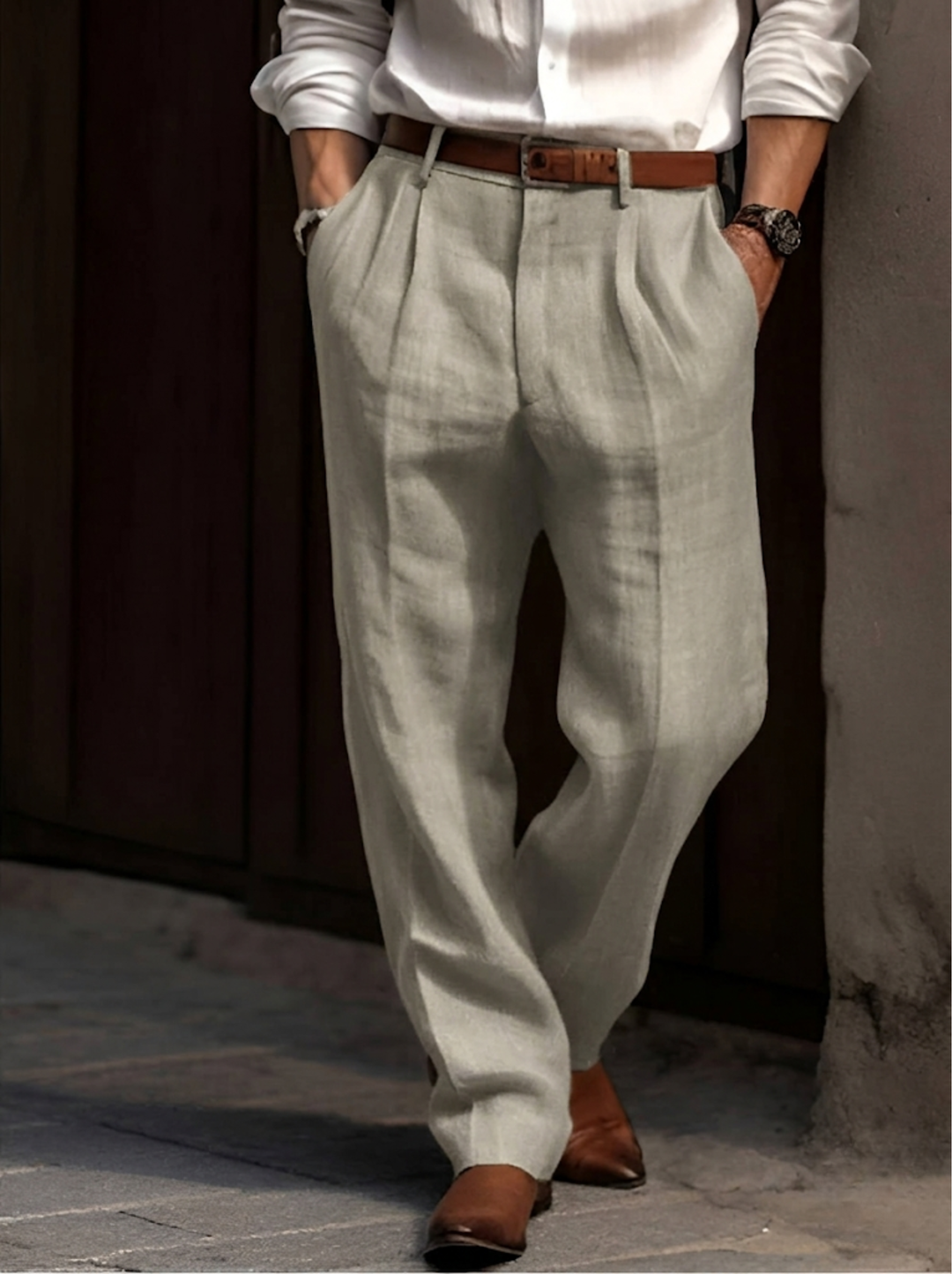 Men's elegant pleated dress pants, straight leg, relaxed fit. Classic style for effortless comfort and versatility.