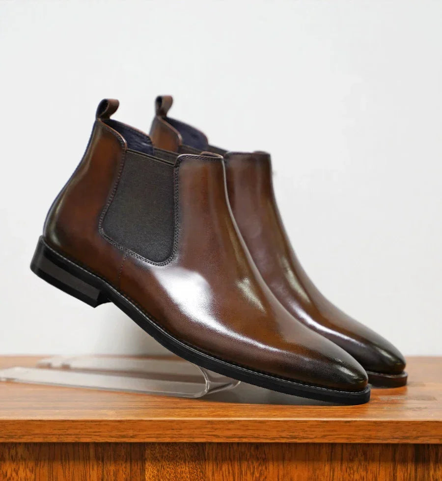 Stylish men's brown Chelsea boots. Slip-on ankle boots, perfect for business casual or everyday fashion.