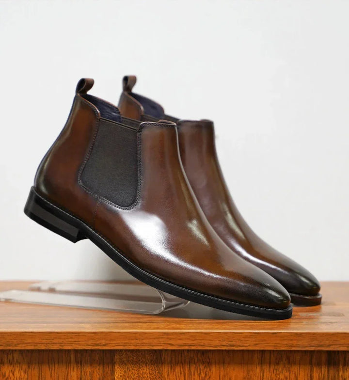 Stylish men's brown Chelsea boots. Slip-on ankle boots, perfect for business casual or everyday fashion.