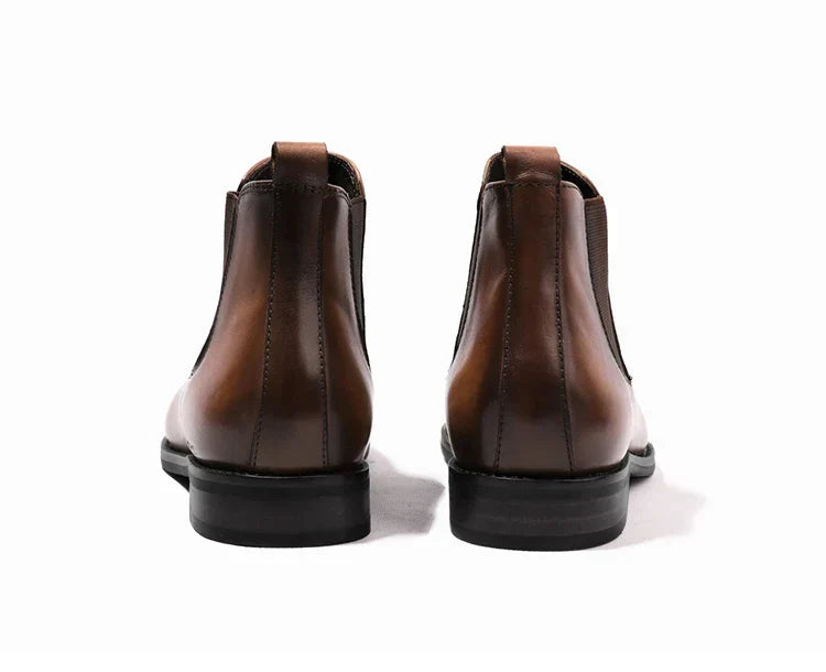 Comfortable men's classic black Chelsea boots. Easy slip-on ankle boots, suitable for modern men's fashion.