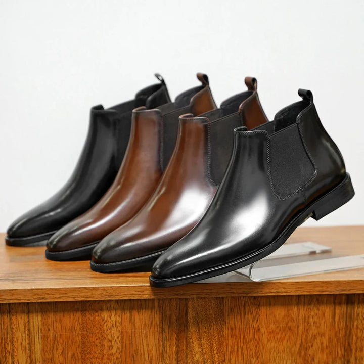 Durable men's brown Chelsea ankle boots. Classic slip-on design provides versatile style for any modern outfit.