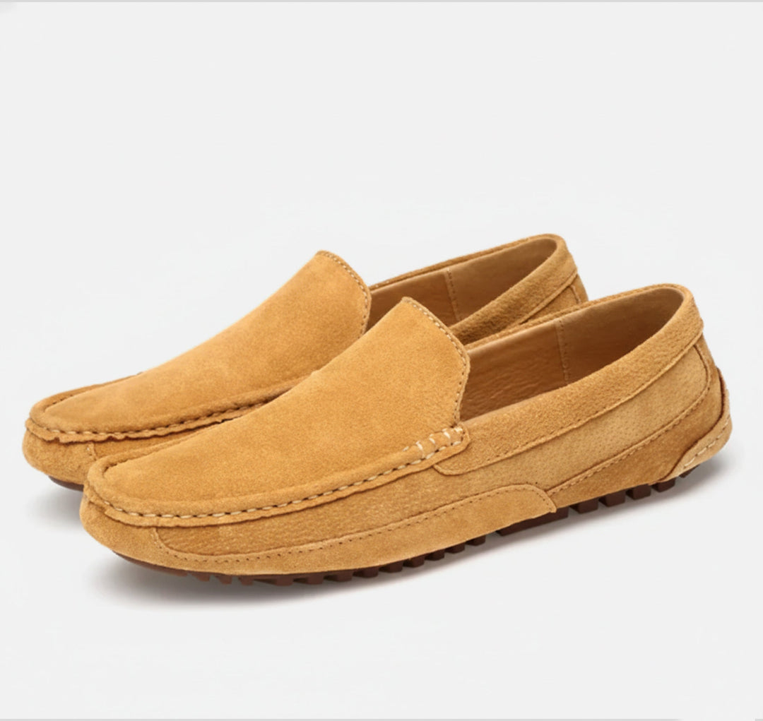 Men's classic black slip-on shoes for effortless everyday style & comfort. Easy wear casual loafers.