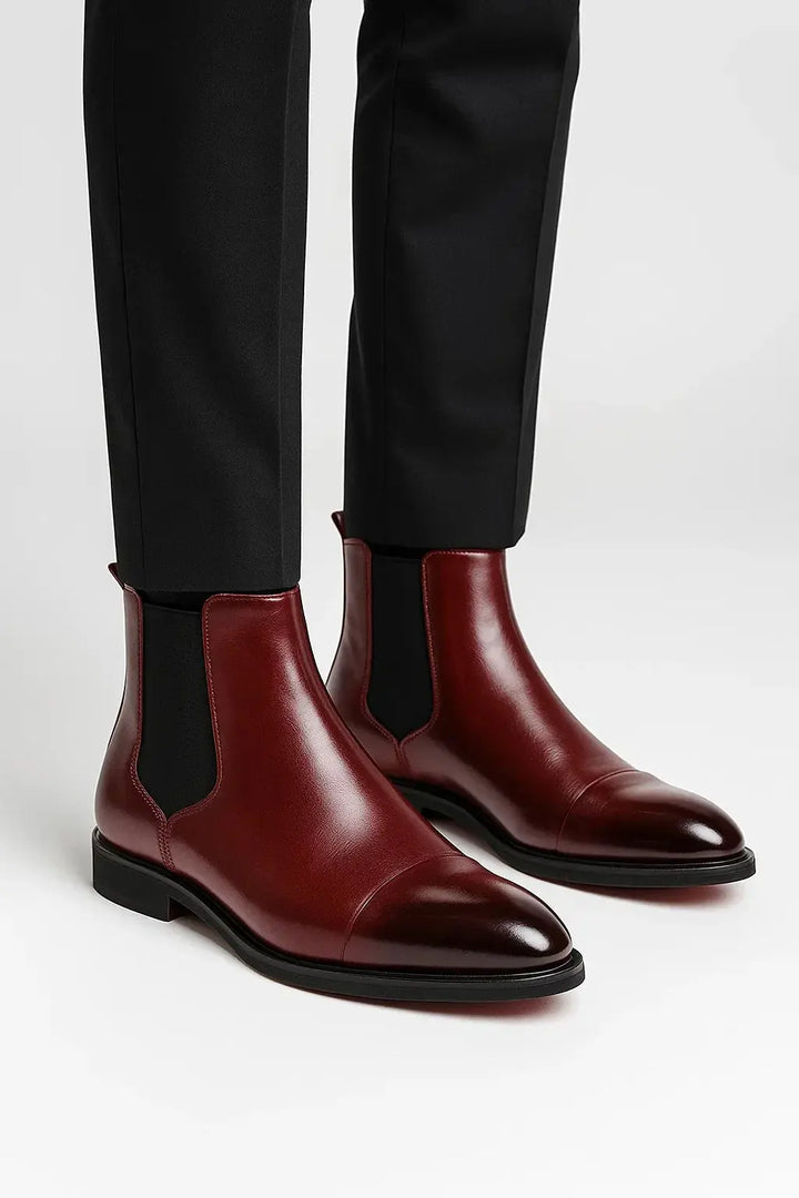 Sophisticated men's ankle boots. Black Chelsea boots offering premium comfort and classic style for any outfit.