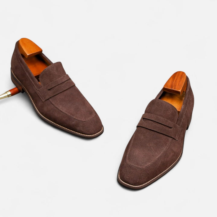 Elegant and simple men's penny loafers. Streamlined slip-on dress shoes for effortless smart casual dressing.