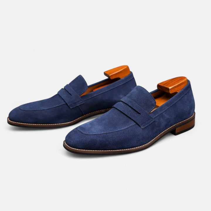 Comfortable men's penny loafers. Stylish slip-on dress shoes, perfect for smart casual or business attire.