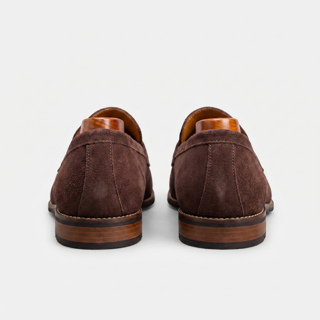 Stylish men's slip-on penny loafers. Easy-to-wear dress shoes, essential for modern men's fashion wardrobe.