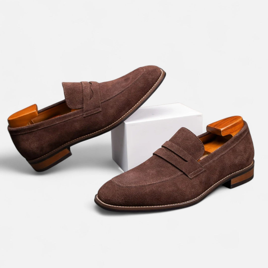 Timeless classic men's penny loafers. Sophisticated slip-on dress shoes, embodying smart casual elegance.