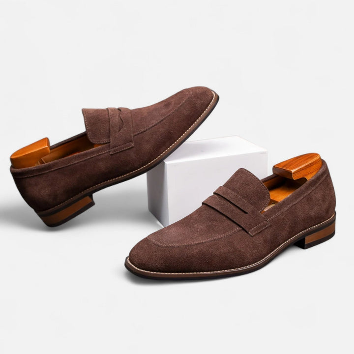 Timeless classic men's penny loafers. Sophisticated slip-on dress shoes, embodying smart casual elegance.