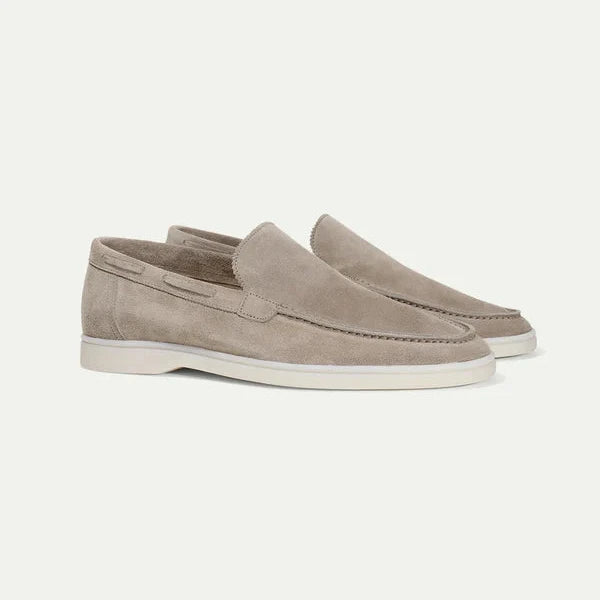 Men's classic brown leather slip-on loafers for versatile style, perfect for both dress and casual occasions.