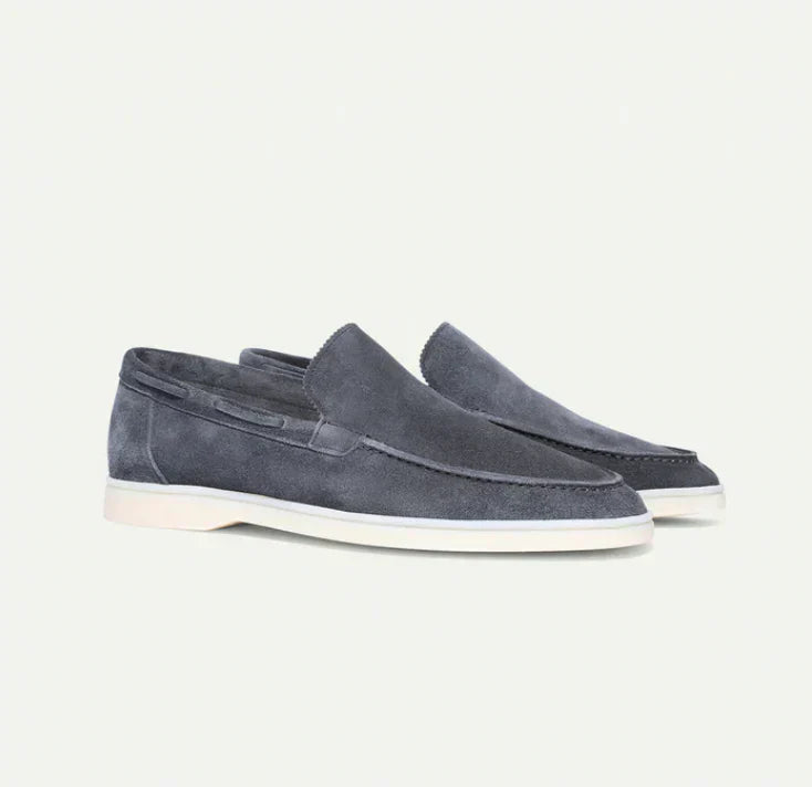 Premium men's leather slip-on loafers, a classic design for versatile footwear and sophisticated men's fashion.