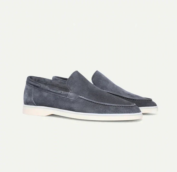 Premium men's leather slip-on loafers, a classic design for versatile footwear and sophisticated men's fashion.