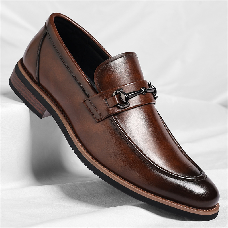 Men's classic brown slip-on loafers, offering comfortable and stylish footwear for any occasion.