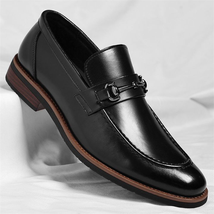 Men's comfortable classic slip-on loafers in brown, essential all-season footwear for stylish men.