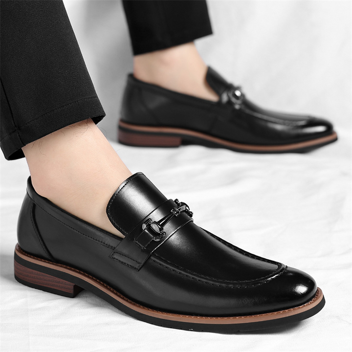 Versatile men's black slip-on loafers, providing ultimate comfort and timeless classic style.