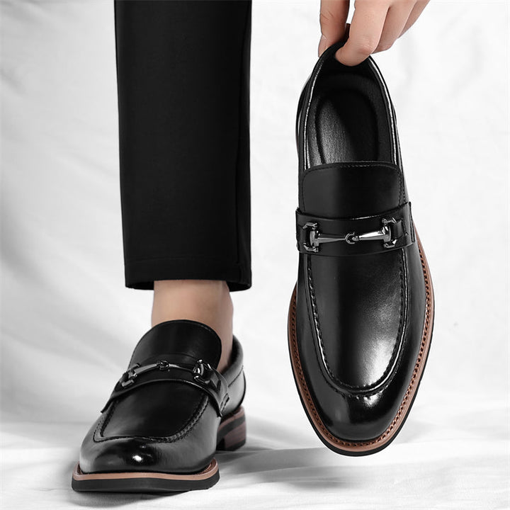 Modern classic men's slip-on loafers, comfortable footwear in a stylish brown finish.