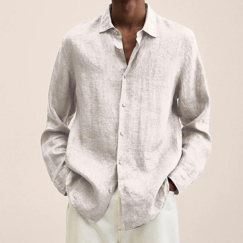 Textured men's long sleeve button down shirt, ideal versatile top for comfortable summer style.