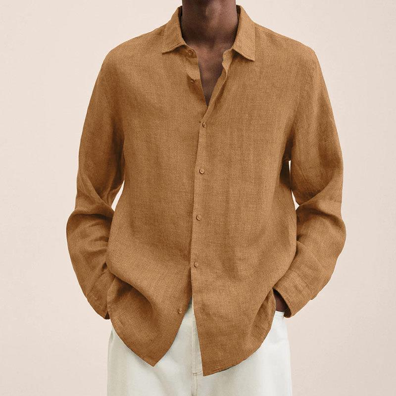Casual men's button down long sleeve shirt styled with rolled sleeves, perfect for everyday summer fashion.